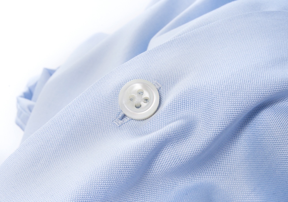 mother of pearl button on a dress shirt