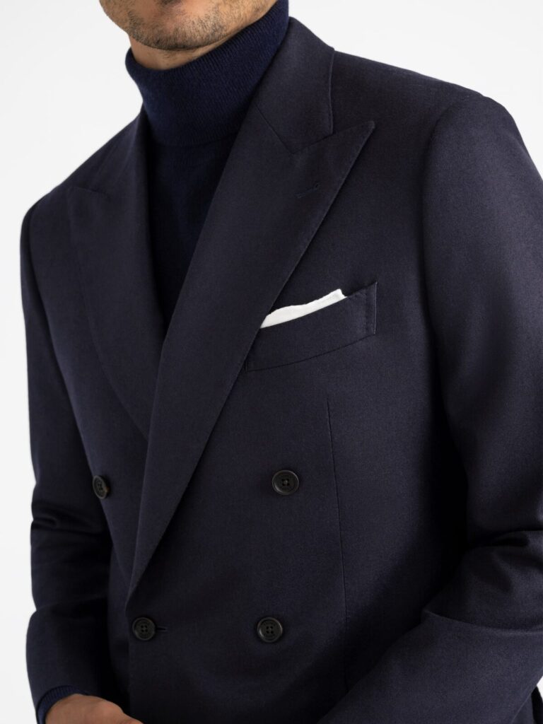 The peak lapel of a double breasted suit.